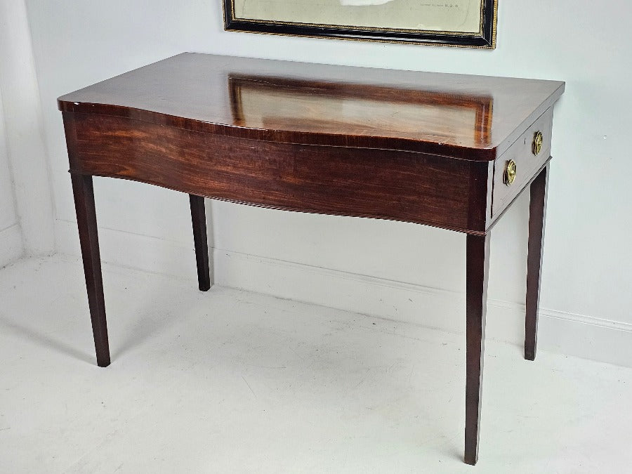 antique serpentine serving table