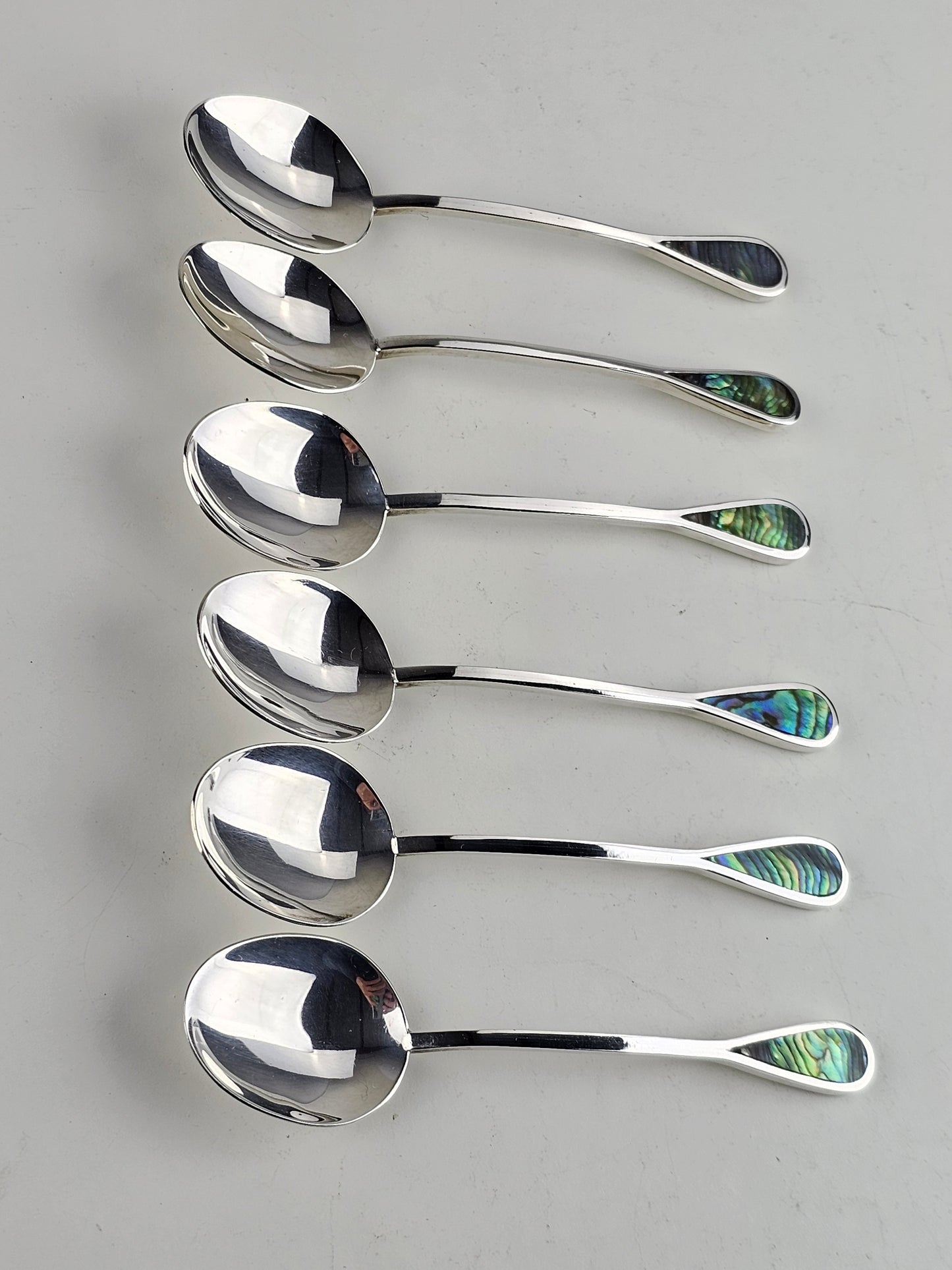 abalone shell & silver spoons
