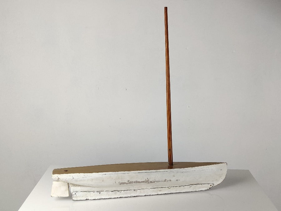 child's toy pond yacht