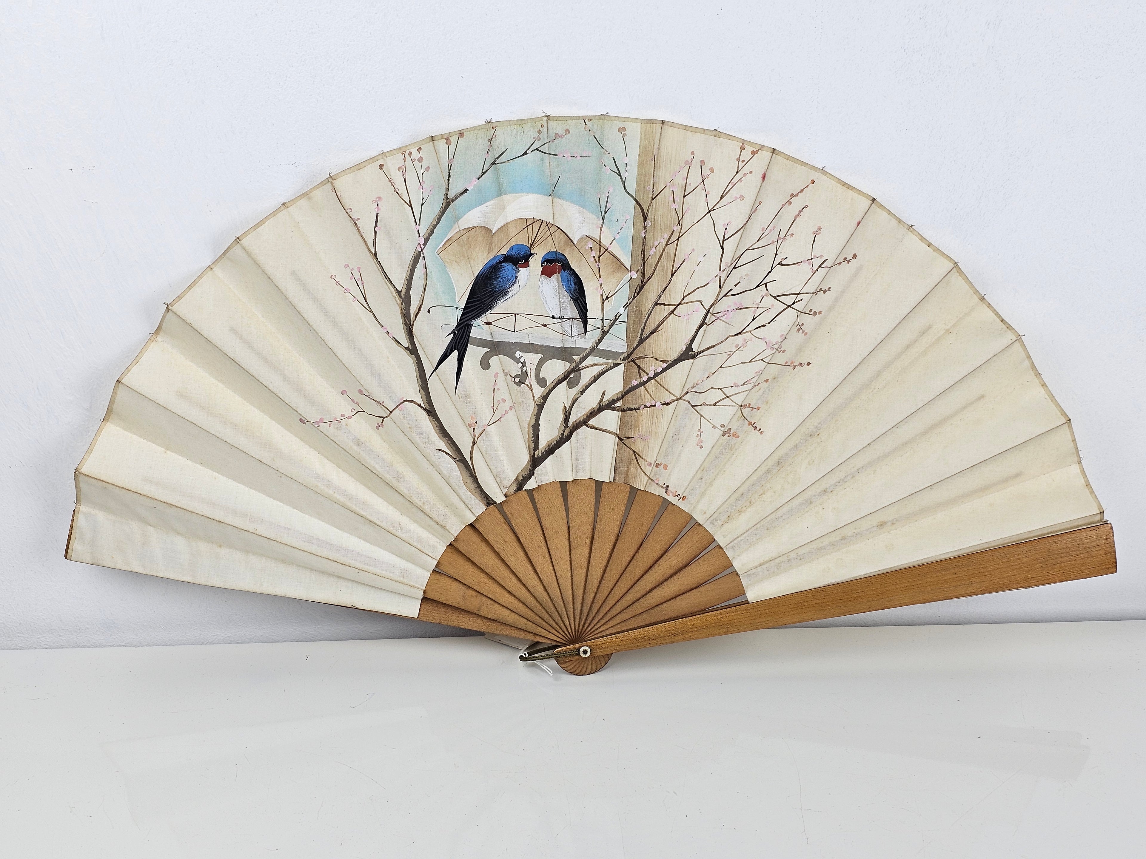 Vintage handheld fan with Swallows