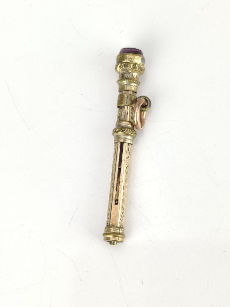 gold retracting pencil