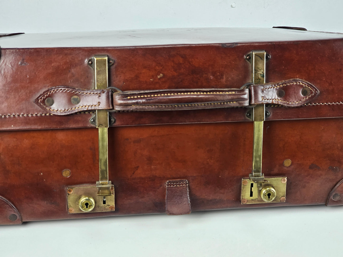 expanding antique Leather suitcase