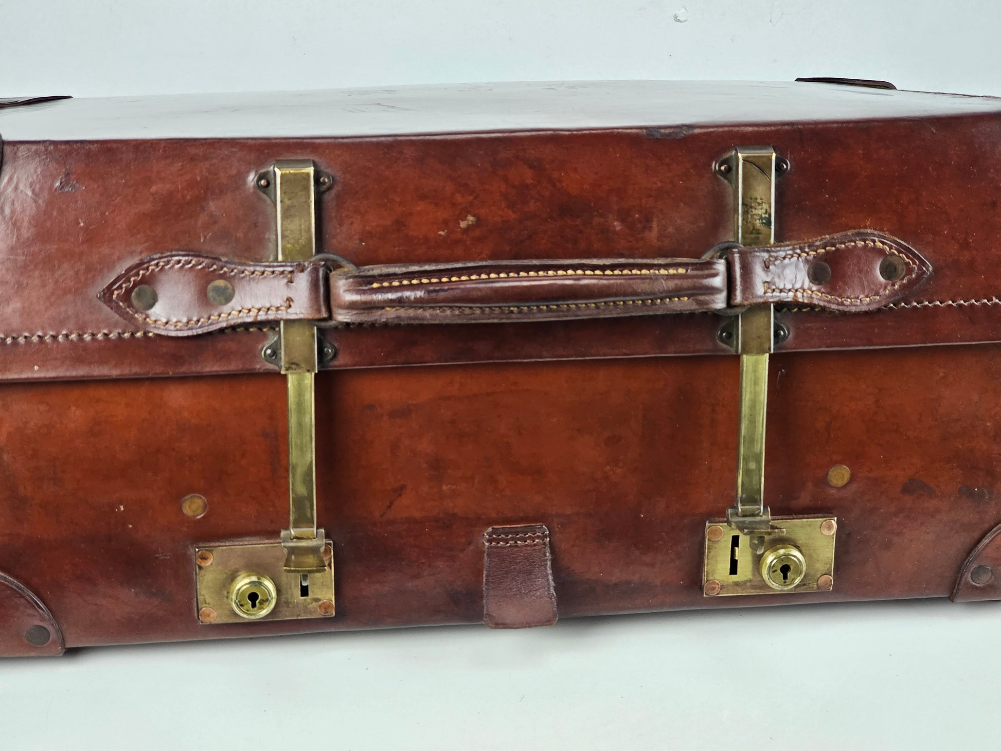 expanding antique Leather suitcase