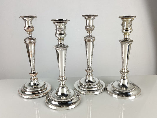 Set of Four Silver Candle Sticks
