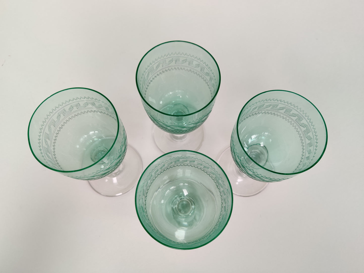Four Vintage Drinks Glasses.