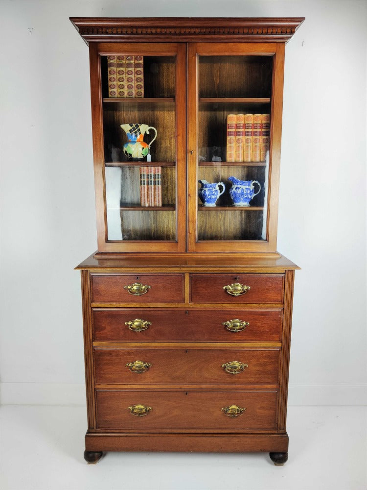 Antique bookcase on chest
