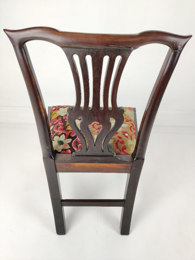 carved back chair