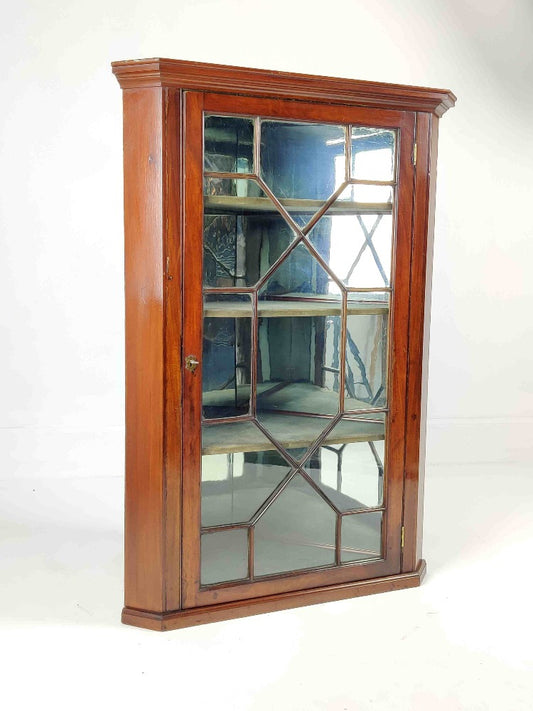glazed corner cupboard