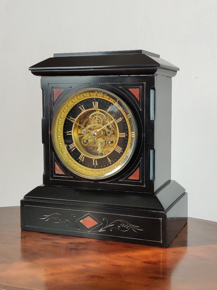 black slate French clock visible escapement