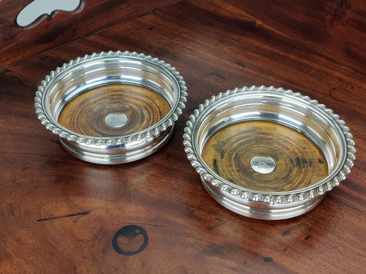 antique silver plated wine coasters 