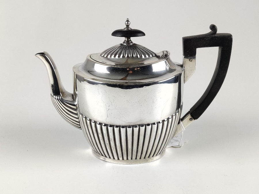 Silver teapot walker & hall